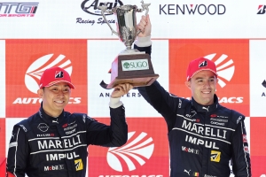 SHERIDAN, WYOMING – October 11, 2024 – Four Nissan Z NISMO GT500s competed in sixth round of the 2024 Super GT series, a 300km race at Sportsland Sugo, on September 22.    Starting from fifth on the grid, and against a backdrop of intermittent rain, the #12 Marelli Impul Z (Kazuki Hiramine/Bertrand Baguette), fought valiantly to secure third place on the podium. The #3 Niterra Motul Z (Mitsunori Takaboshi/Atsushi Miyake) finished in sixth place.  