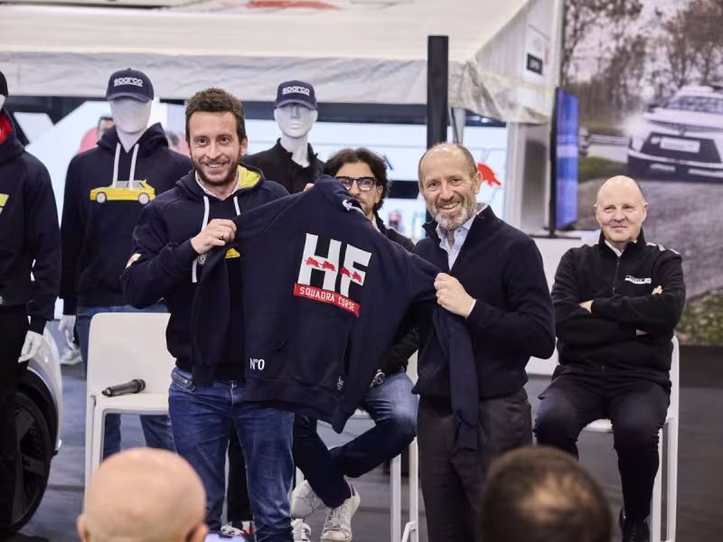 The HF Look is Back in Style: The New Lancia and Sparco Co-branded Sportswear Line Introduced at the “Rally Racing Meeting”