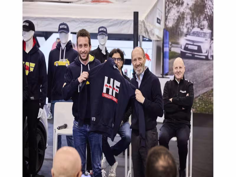 The HF Look is Back in Style: The New Lancia and Sparco Co-branded Sportswear Line Introduced at the “Rally Racing Meeting”