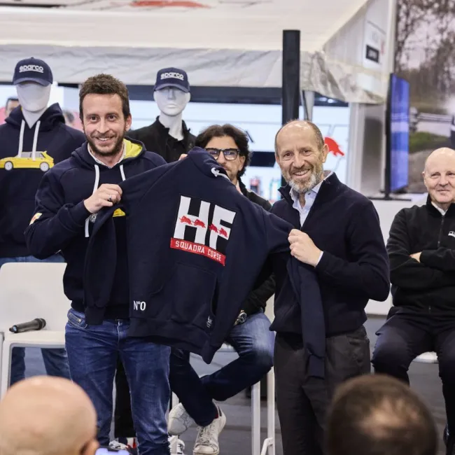 The HF Look is Back in Style: The New Lancia and Sparco Co-branded Sportswear Line Introduced at the “Rally Racing Meeting”